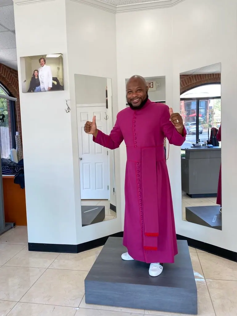 An ATL Tailor client wearing custom-made clergy garments