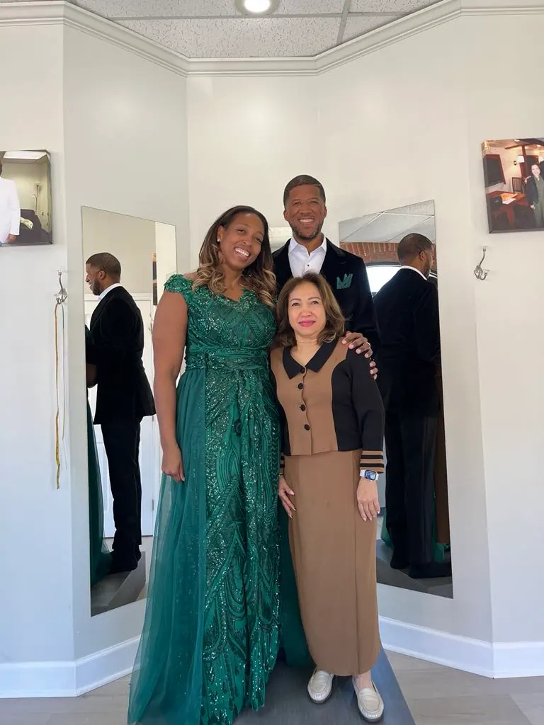 green dress and black velvet suit for couples