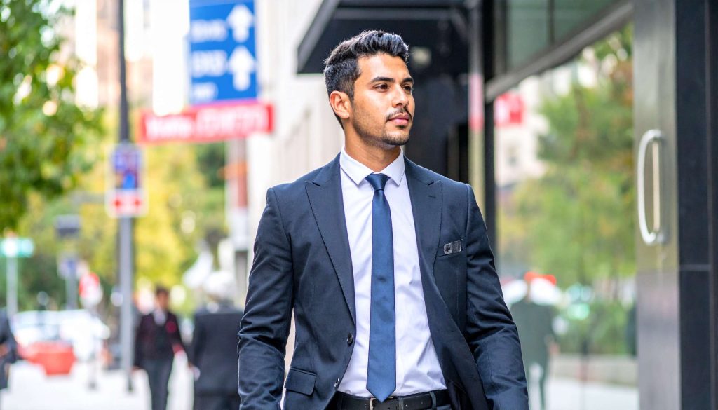 A sharply dressed professional